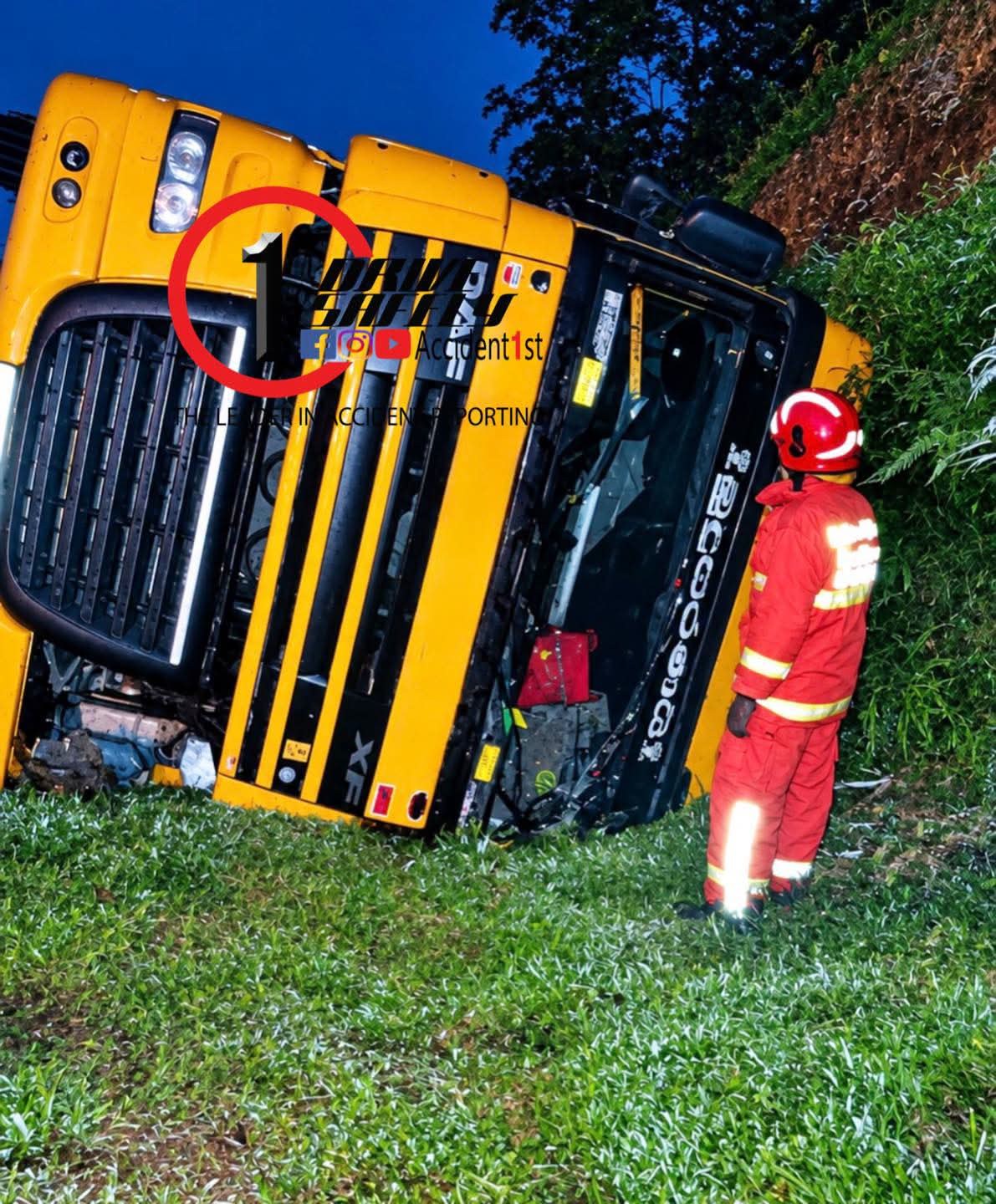 A cement transport prime mover overturns on the Southern Expressway