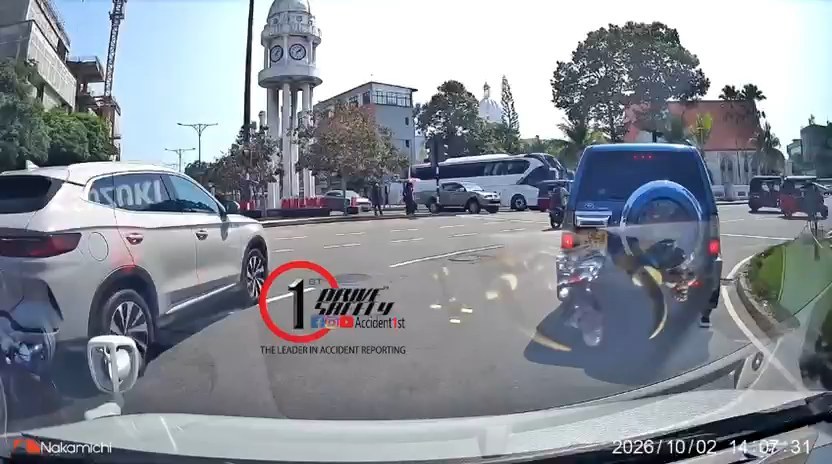 A dash camera shows how a car that was running in violation of traffic signals collided with a motorcycle at Colombo Town Hall