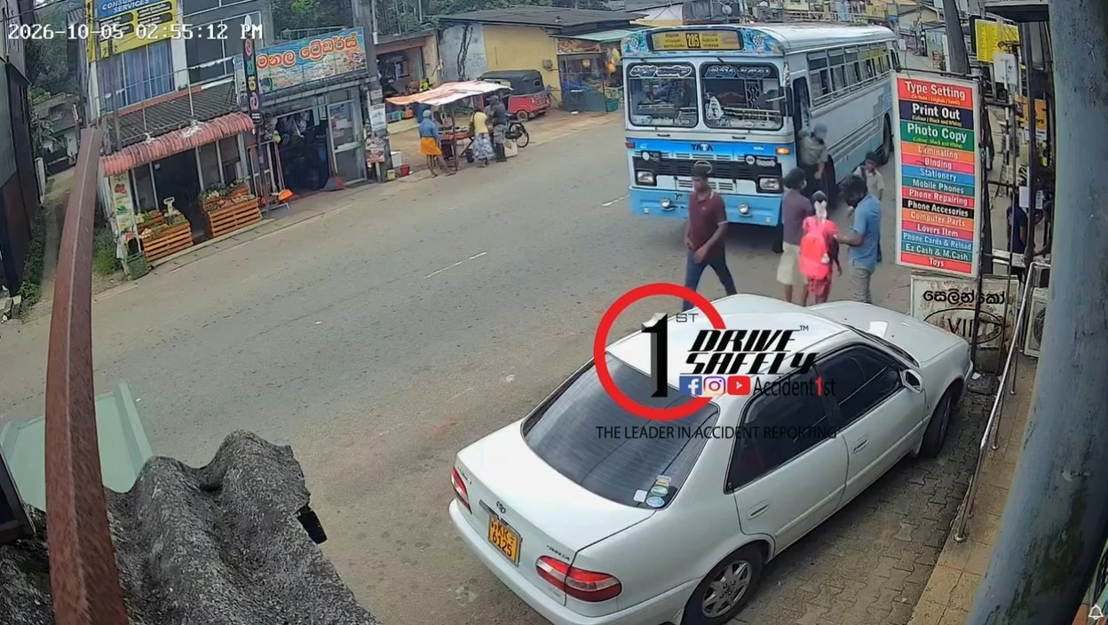 The CCTV camera shows how a woman who carelessly crossed the road through the blind spot of a stopped bus narrowly escaped being run over by the bus.