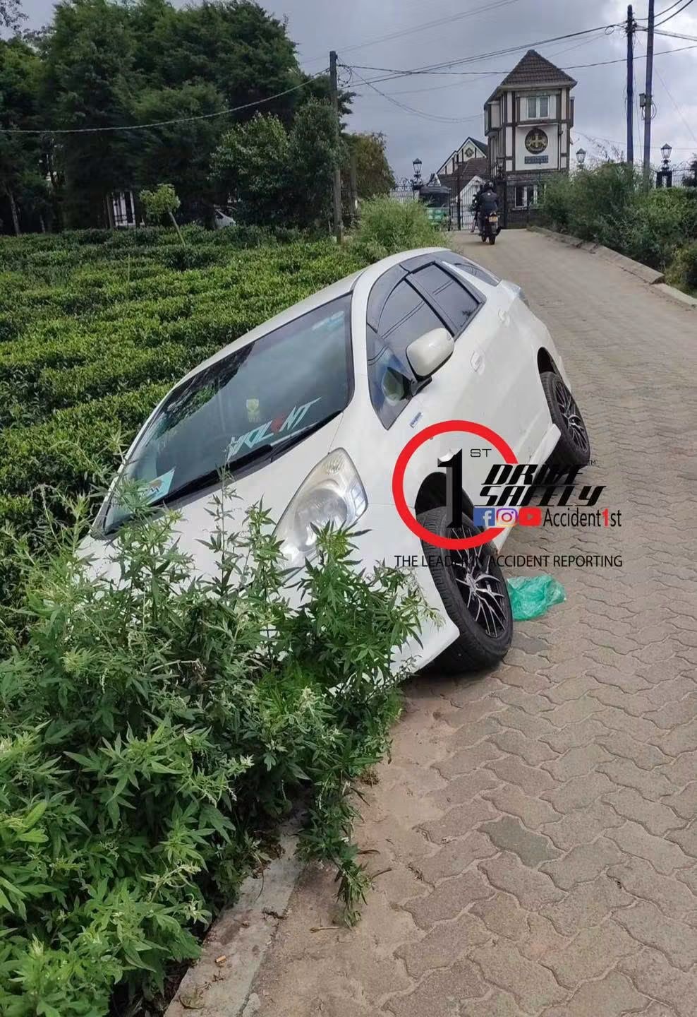 An accident occurred near the Nuwara Eliya Little England Resort when a car lost control and overturned towards the tea garden.