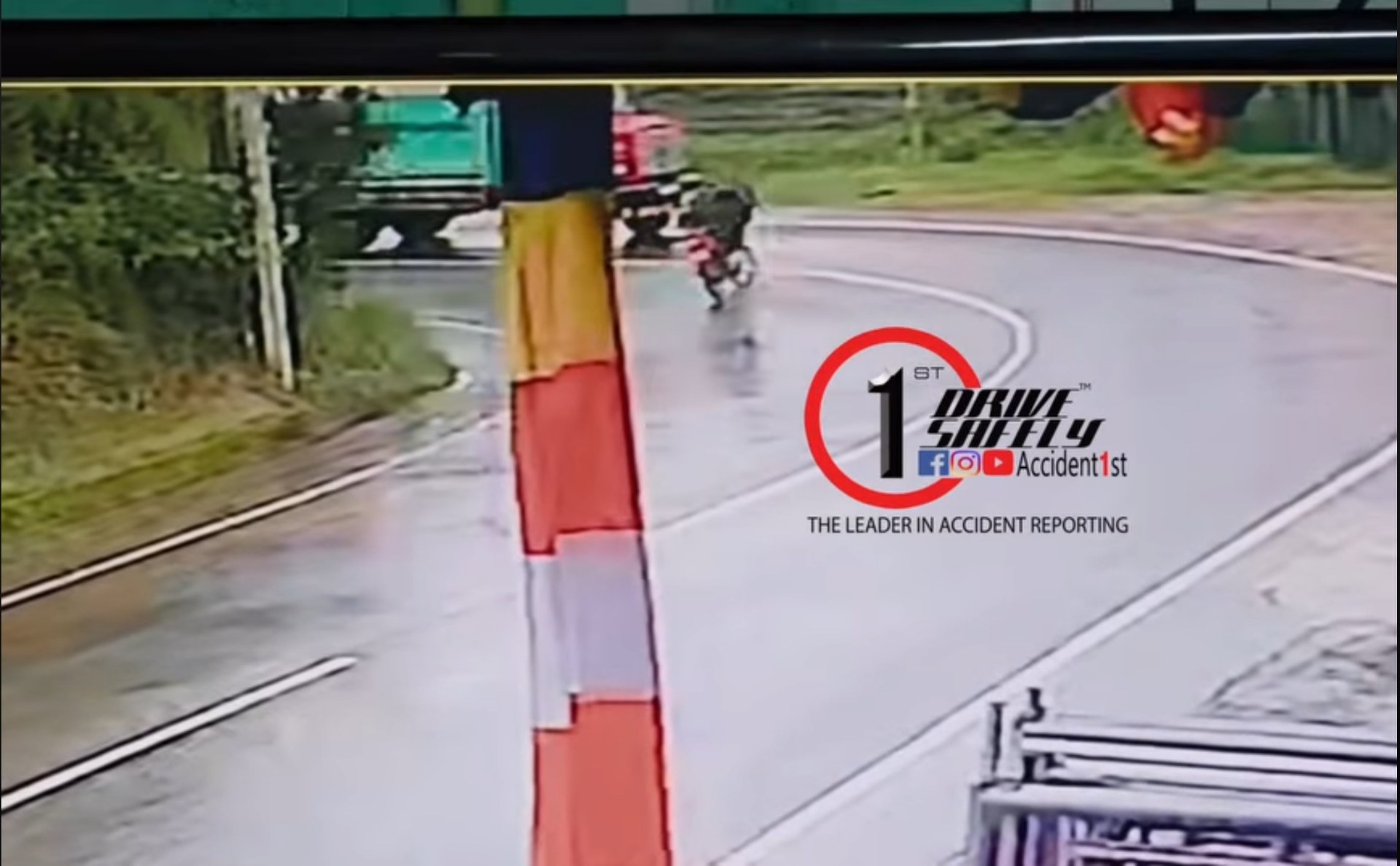 The CCTV camera shows how a motorcycle that skidded in a humid bend on the Hatton-Nuwaraeliya road collided with a lorry and escaped with ninety-nine lives.