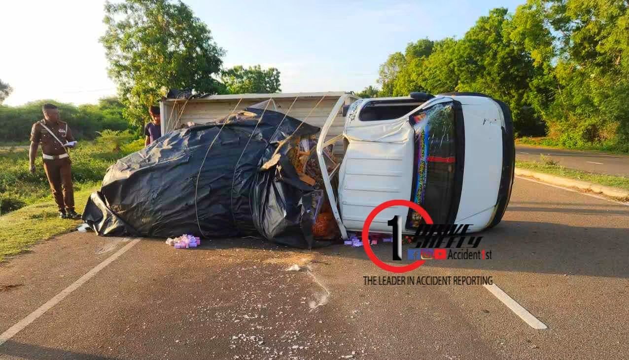 A small lorry transporting vegetables overturned in the middle of the road and caused an accident near the dry zone botanical garden on Suriyawewa road.