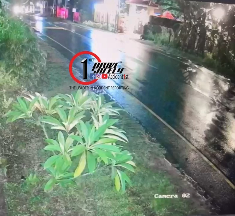 On Bandaragama-Kalutara road, a three-wheeler that pulled into the opposite lane in the rain collides head-on with a van coming in front: CCTV camera