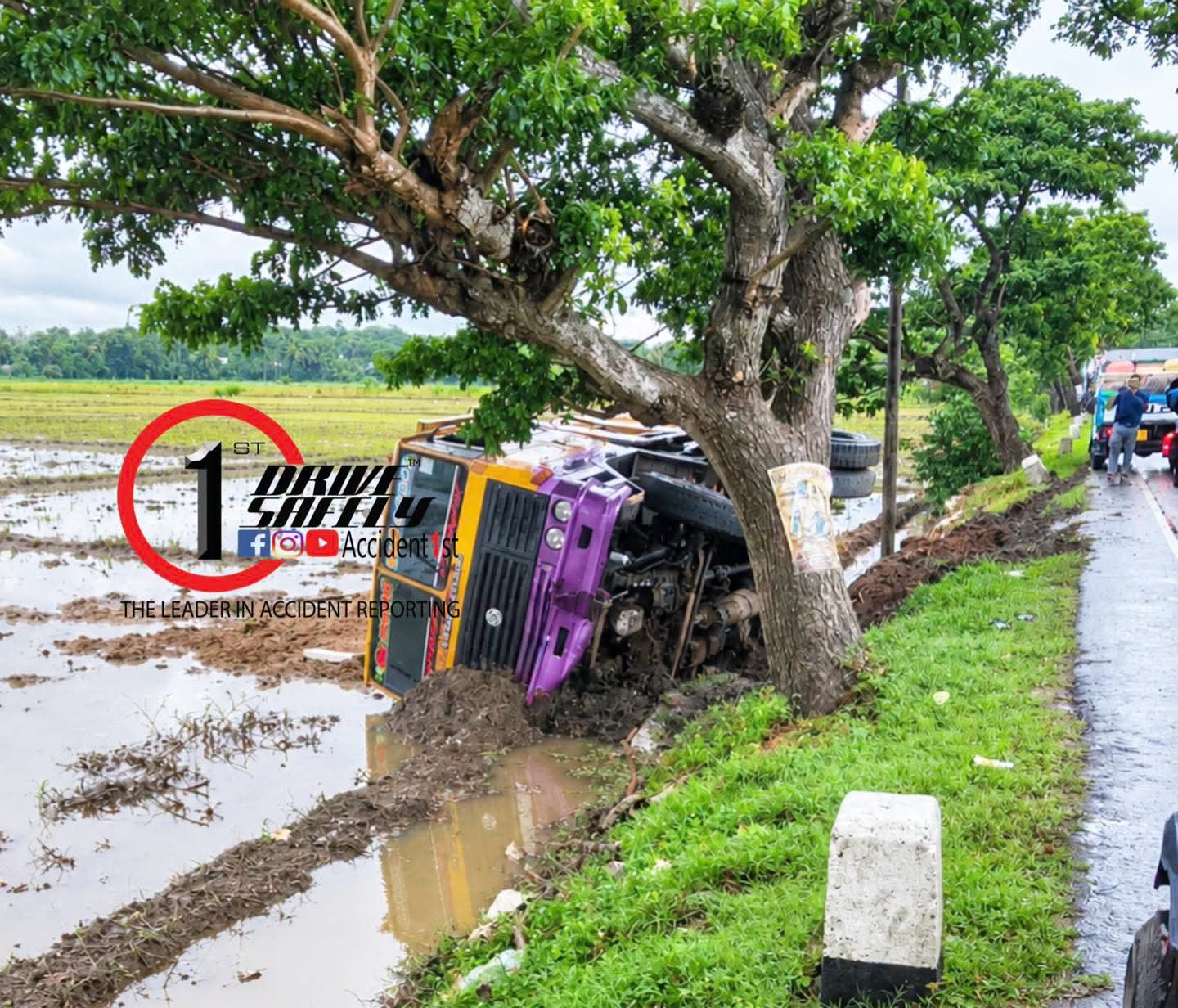 Loaded Tipper Truck Overturns Into Paddy Field After Skidding on Tissa-Matara Road in Ranna