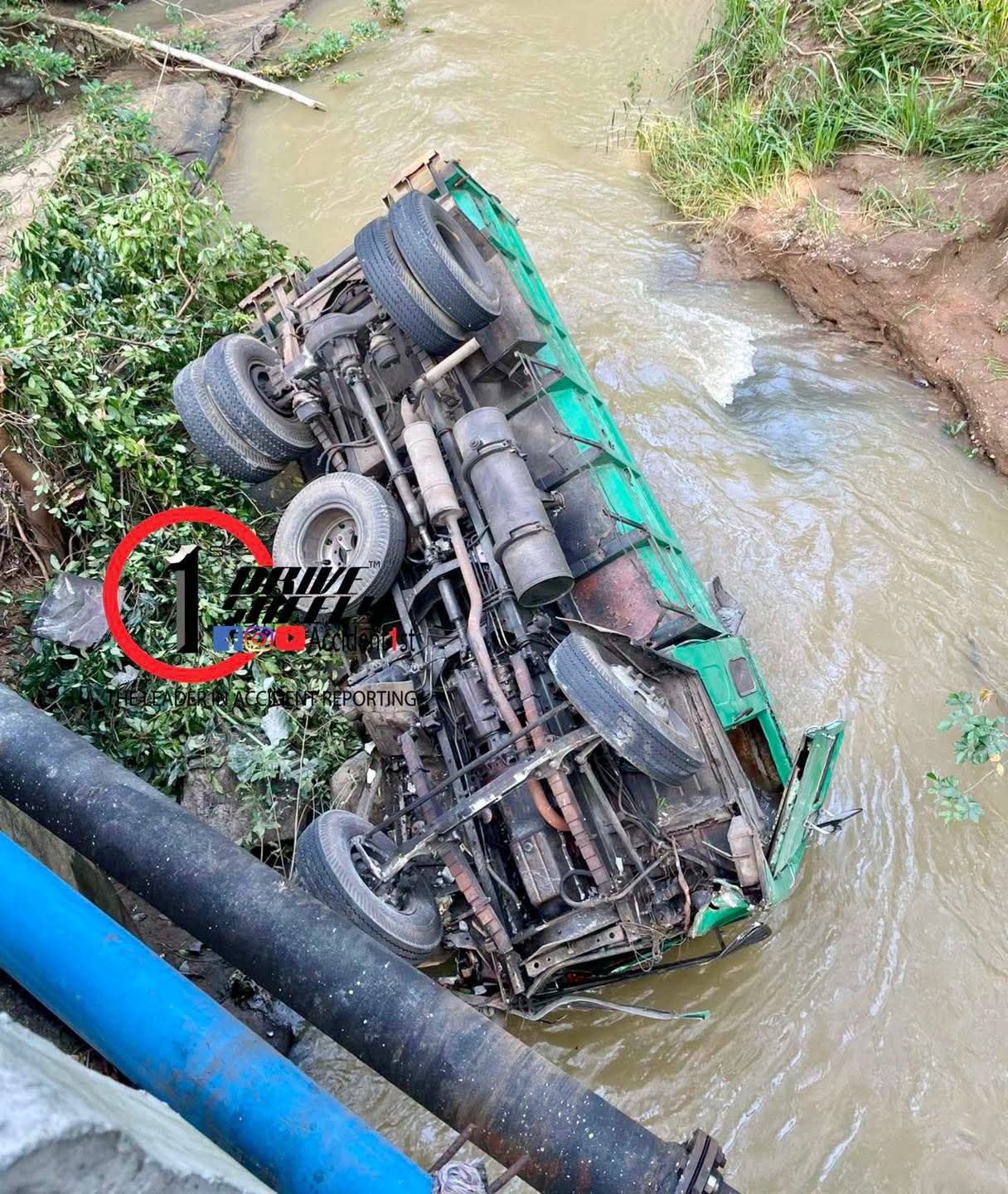Tipper Truck Crashes Through Concrete Barrier and Overturns into Stream Near Kalu Bridge on Galewela-Dambulla Road